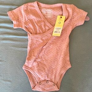 Brand new 6-9 mauve loved baby bodysuit